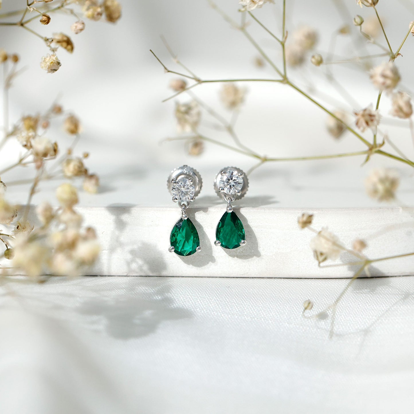 Pear Cut Lab Created Emerald and Moissanite Teardrop Earrings