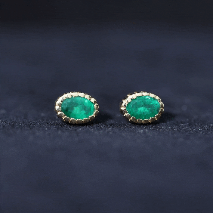 0.8 Carat Oval Emerald Solitaire Stud Earrings in Bezel Setting