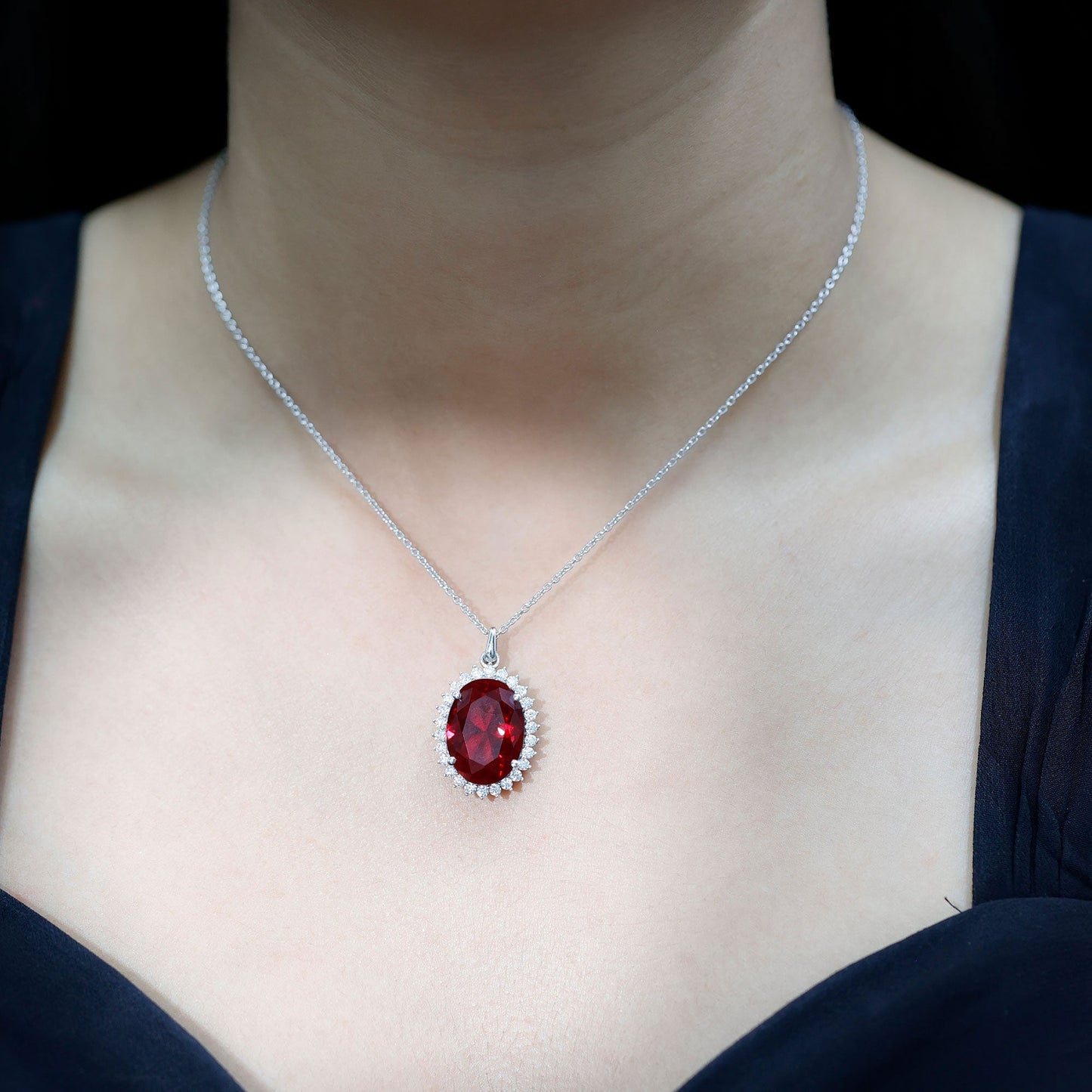 Sterling Silver 14 carat Lab Grown Ruby Oval Necklace with Halo