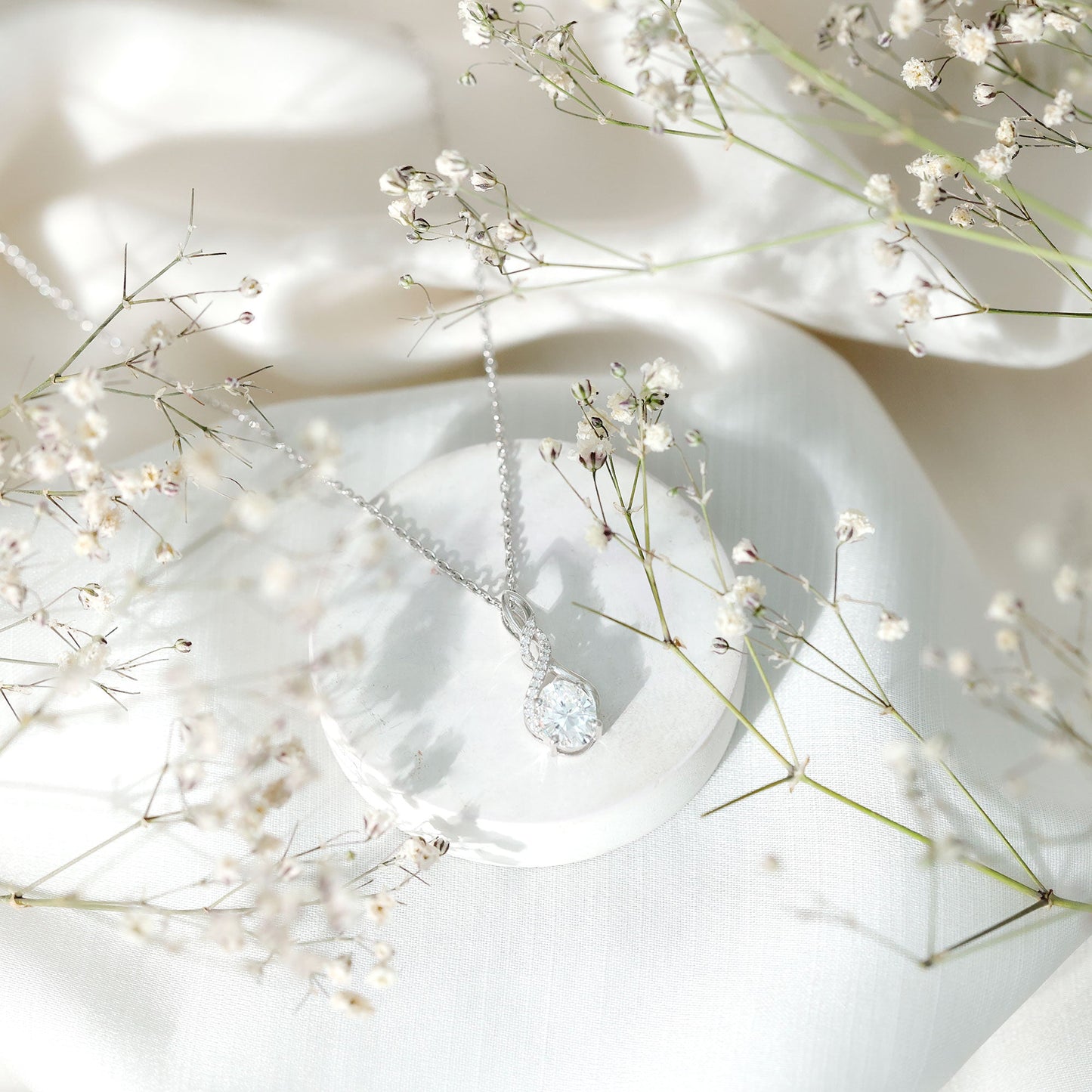 1.25 Carat Moissanite Infinity Necklace in Sterling Silver