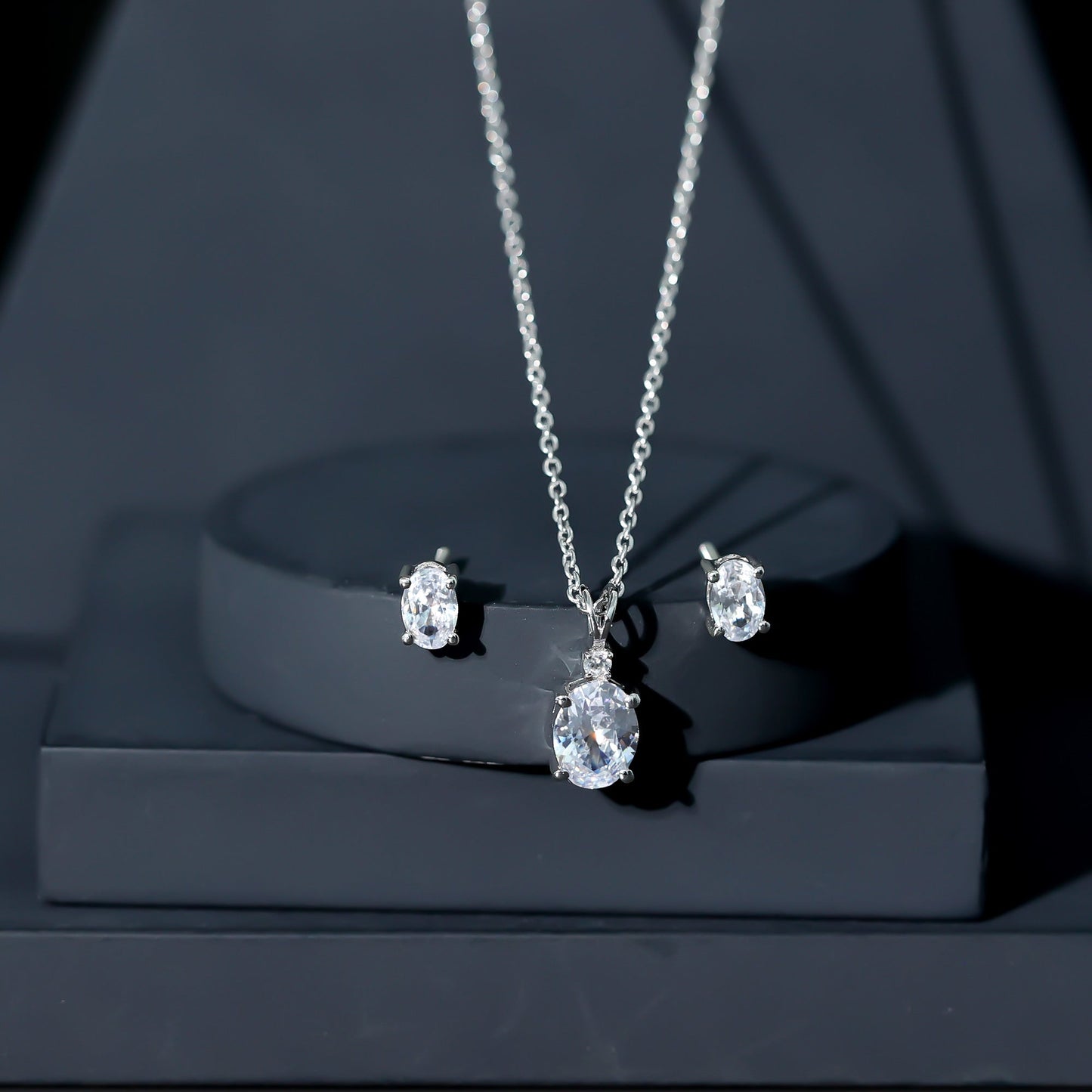 Oval Cut Cubic Zirconia Solitaire Necklace and Earrings in Silver