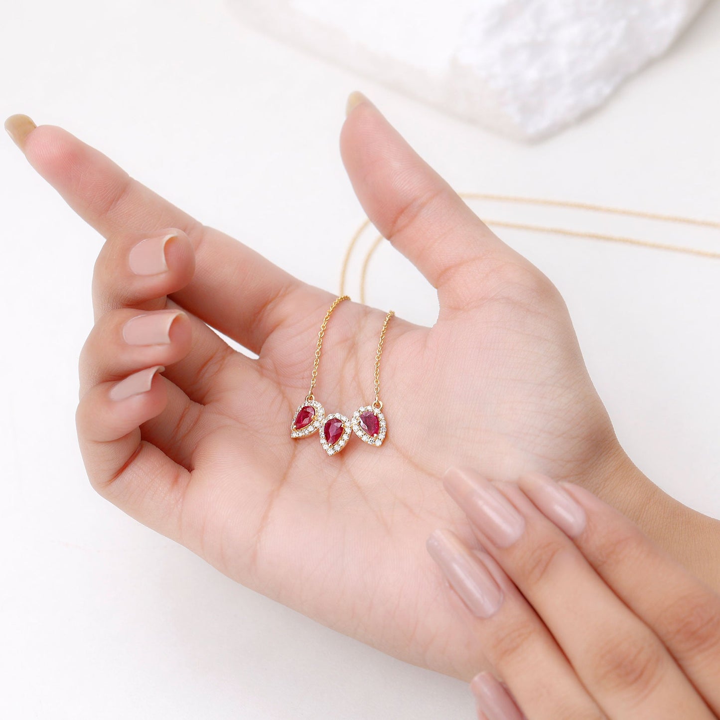 Pear Cut Lab Created Ruby Three Stone Necklace with Moissanite Halo