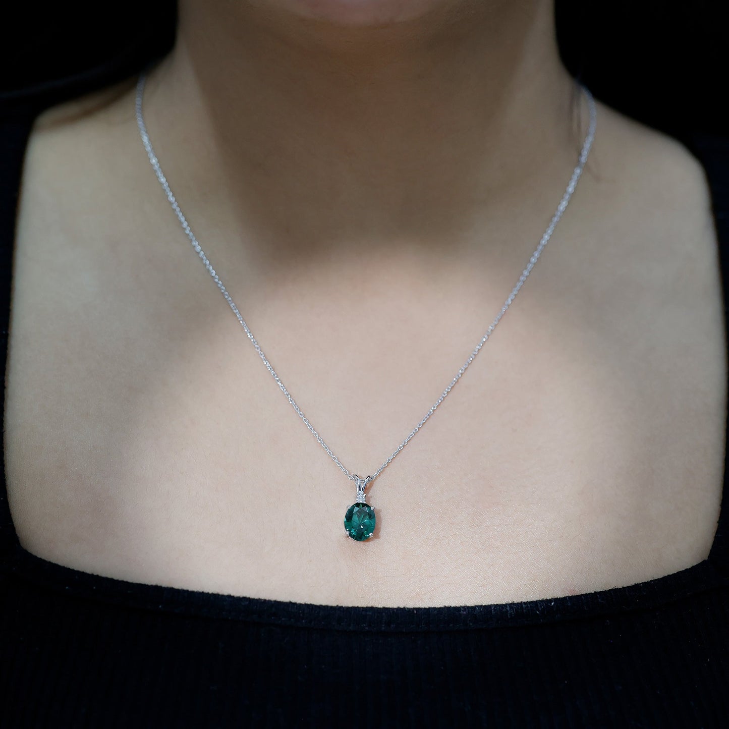 Oval Created Emerald and Moissanite Solitaire Pendant