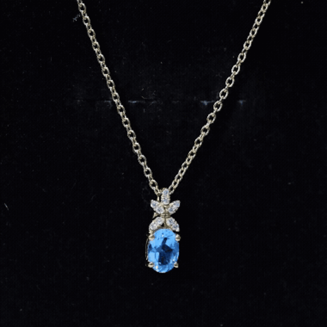 Oval Cut 0.65 Carat Swiss Blue Topaz and Diamond Flower Necklace with Chain