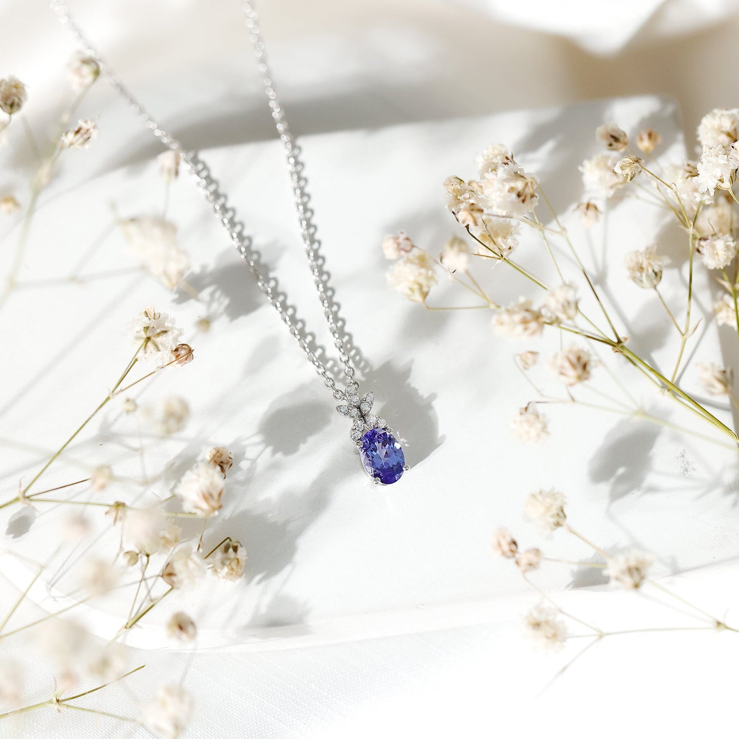 Oval Shaped 1 Carat Tanzanite Pendant Necklace with Diamond Flower
