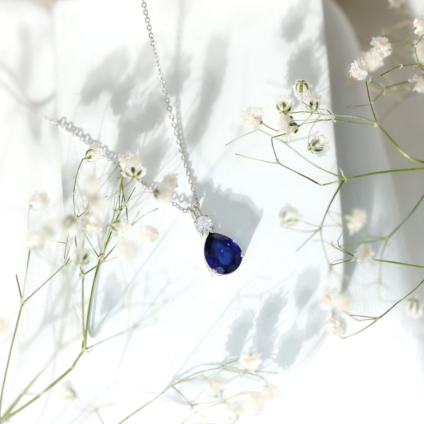 Lab Created Blue Sapphire Teardrop Pendant Necklace with Diamond