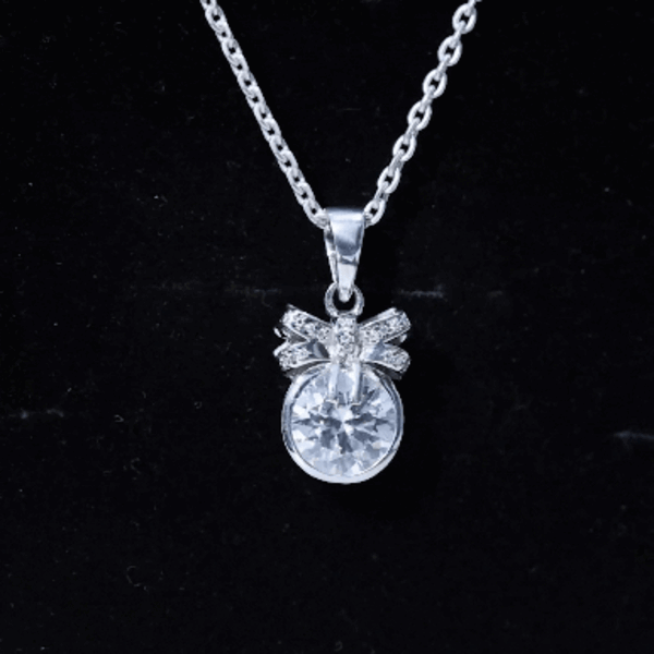 Bezel Set 2 Carat Moissanite Pendant with Bow