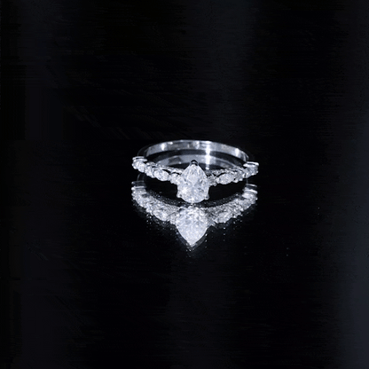 Solitaire Moissanite Teardrop Engagement Ring with Surprise Band