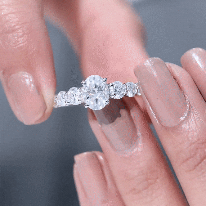 1.2 Carat Oval Cut Moissanite Side Stone Engagement Ring