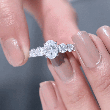 1.2 Carat Oval Cut Moissanite Side Stone Engagement Ring