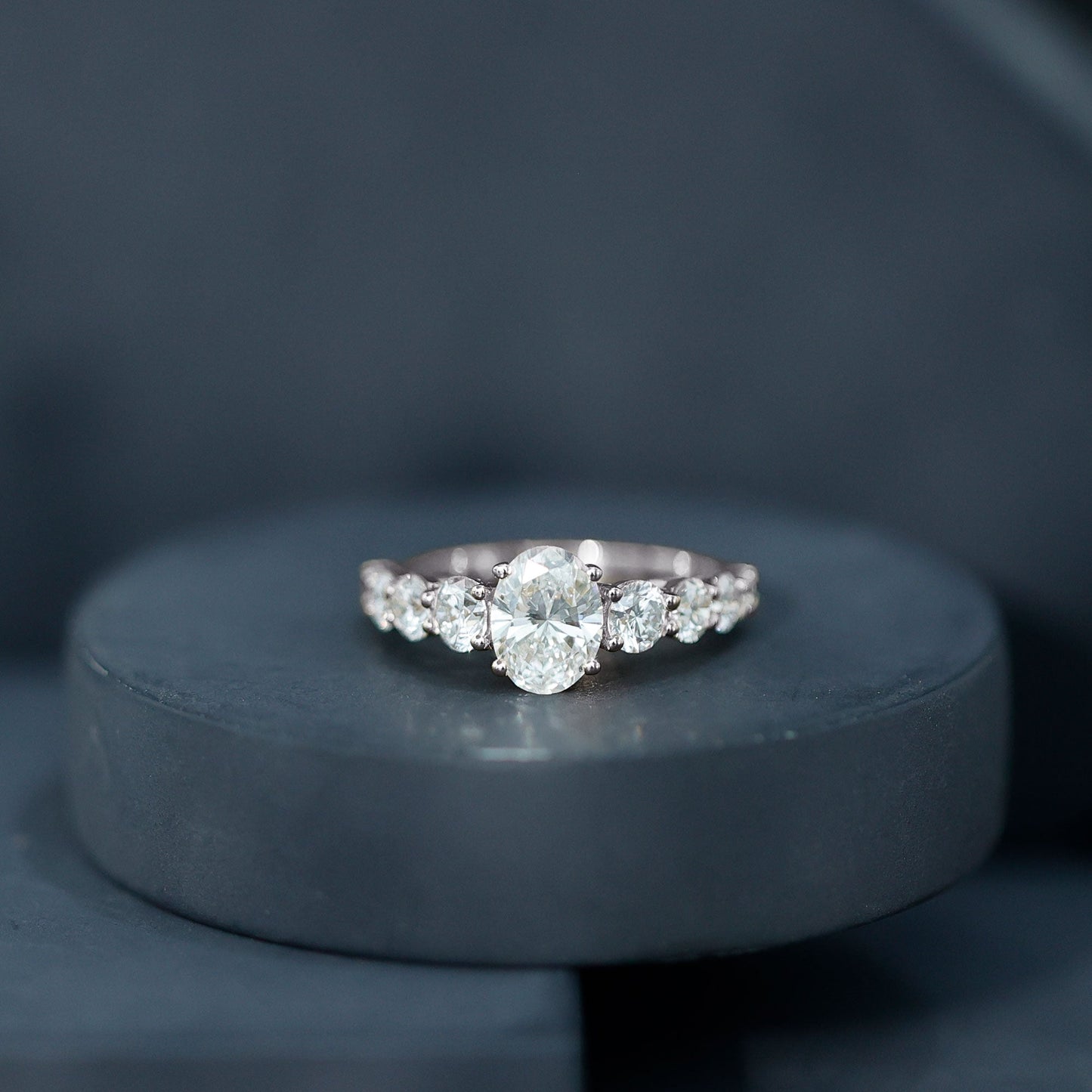 1.2 Carat Oval Cut Moissanite Side Stone Engagement Ring