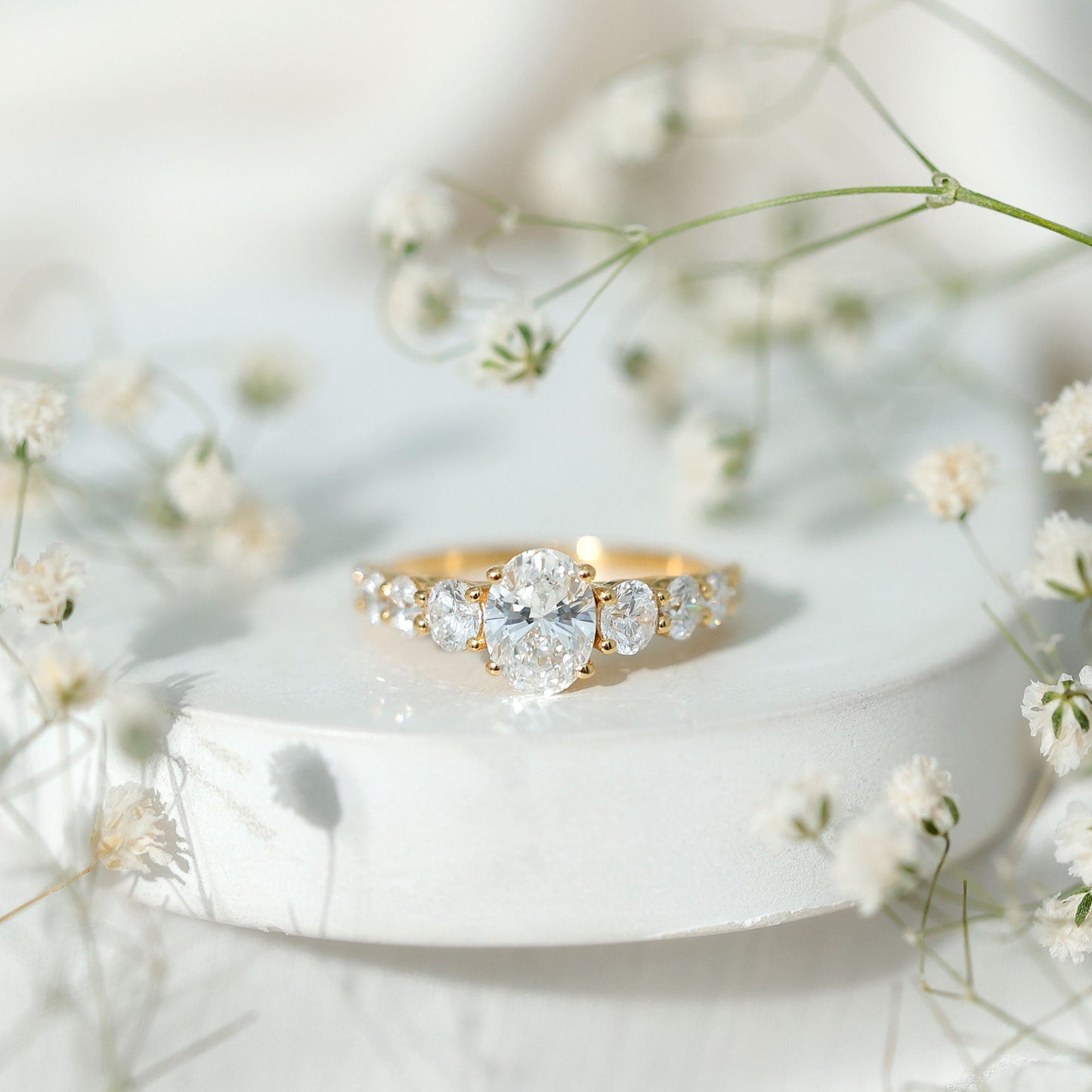 1.2 Carat Oval Cut Moissanite Side Stone Engagement Ring