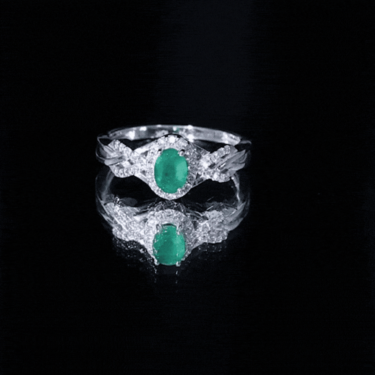 Designer Emerald Oval Engagement Ring with Diamond Halo