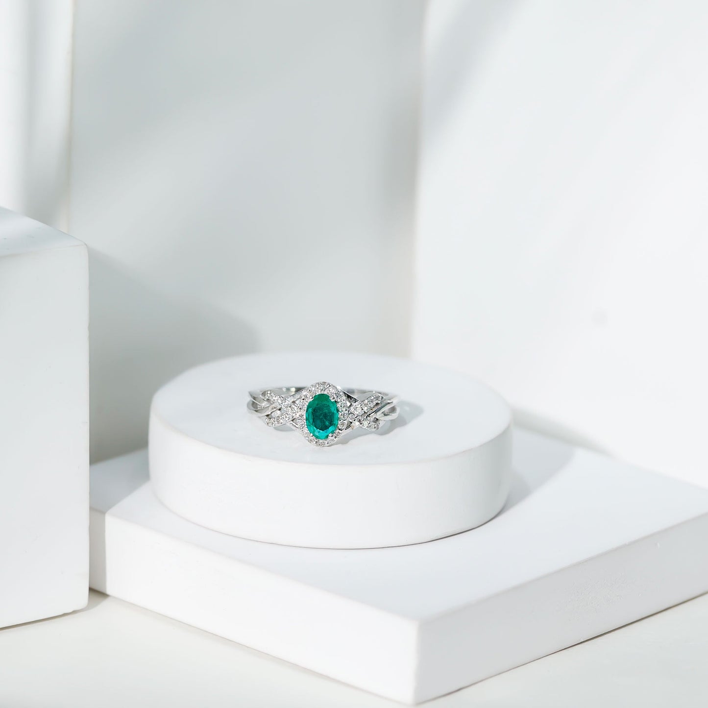 Designer Emerald Oval Engagement Ring with Diamond Halo