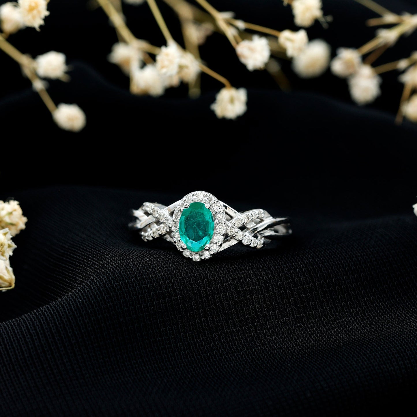 Designer Emerald Oval Engagement Ring with Diamond Halo