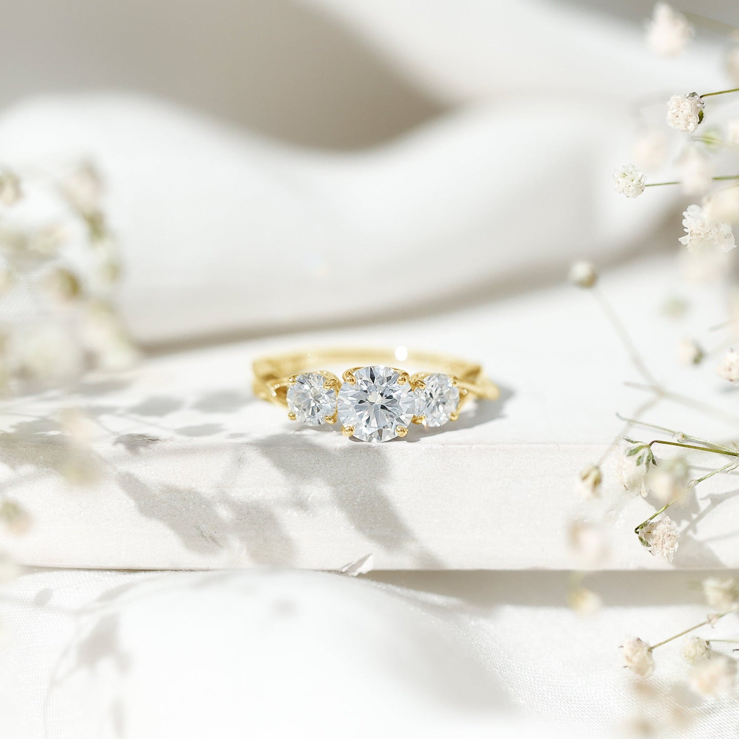3 Stone Round Moissanite Crossover Engagement Ring