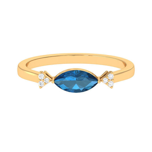 0.7 Carat Marquise cut London Blue Topaz East West Promise Ring with Diamond