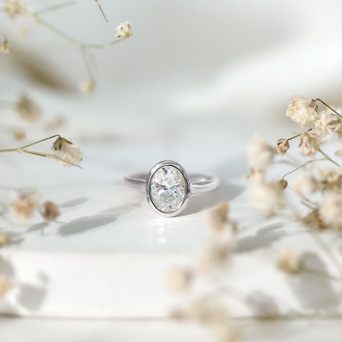 Certified 1 Carat Lab Grown Diamond Bezel Set Engagement Ring
