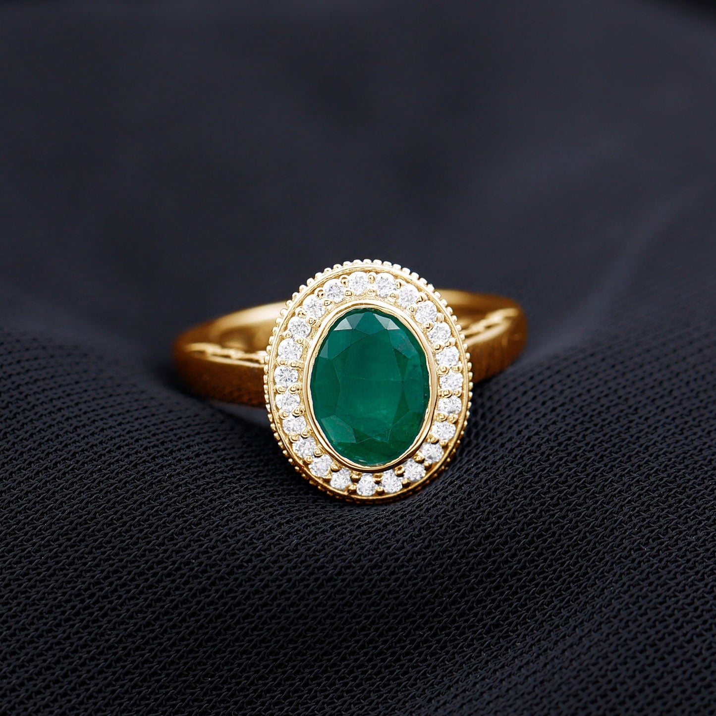 1.2 Carat Oval Lab Grown Emerald Bezel Set Engagement Ring With Diamond Halo