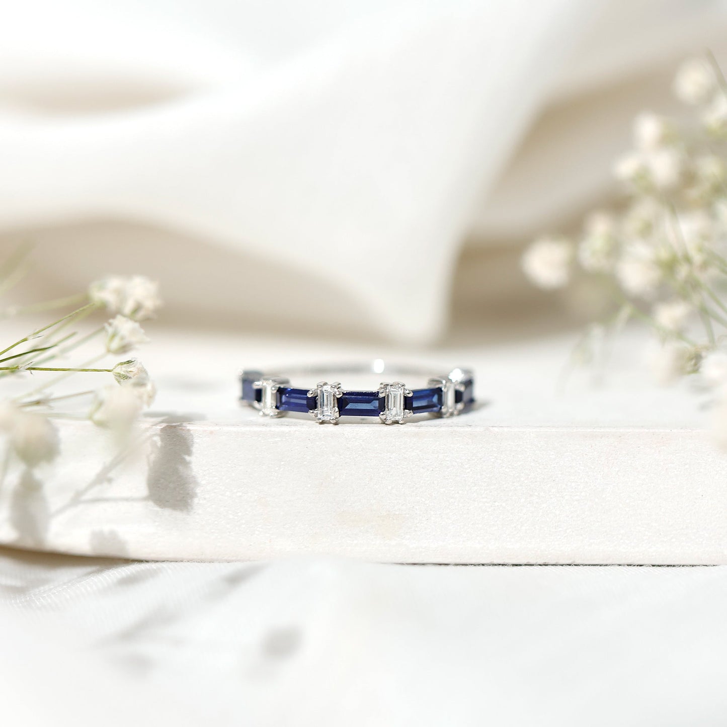 Blue Sapphire and Diamond Half Eternity Ring