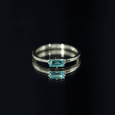 East West Set Baguette Cut Emerald May Birthstone Ring