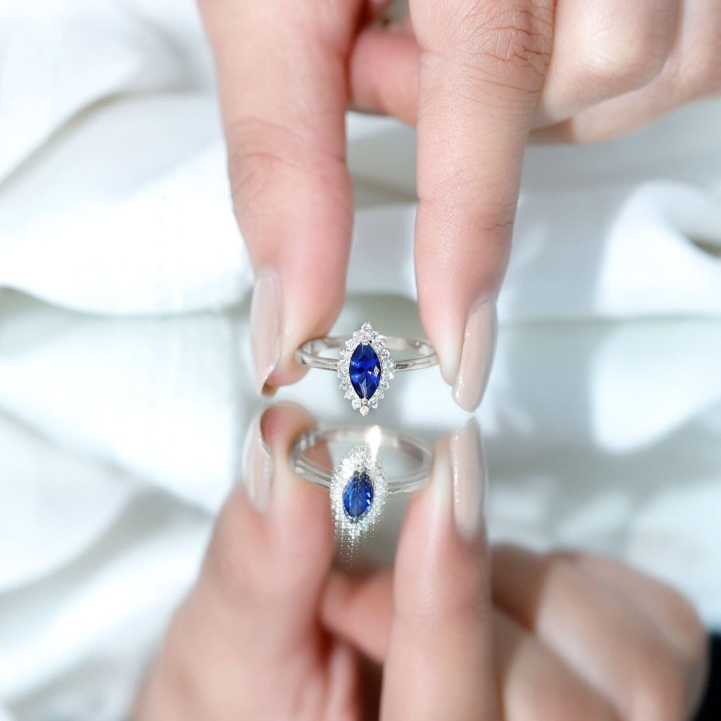 Marquise Cut Lab Grown Blue Sapphire and Diamond Halo Engagement Ring