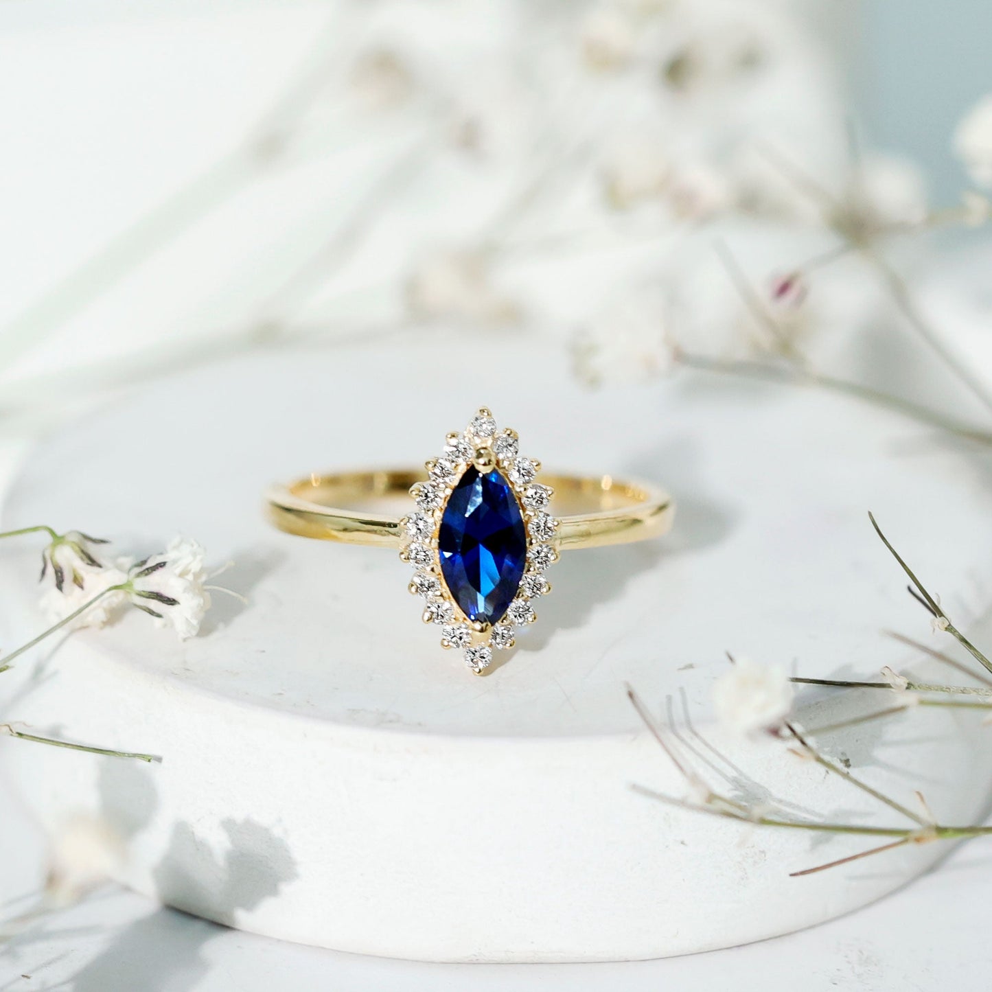 Marquise Cut Lab Grown Blue Sapphire and Diamond Halo Engagement Ring