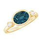 Oval London Blue Topaz Bezel Set Engagement Ring with Diamond