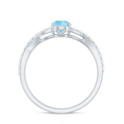 Split Shank Pear Cut Aquamarine Solitaire Ring with Diamond