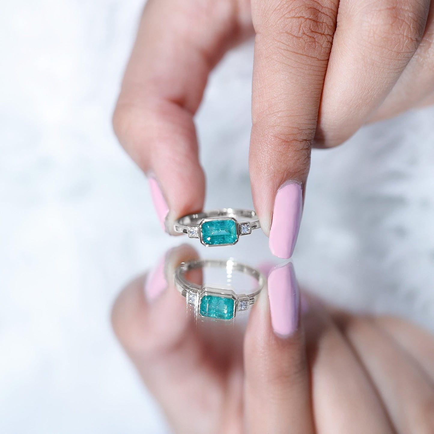 Octagon shape Emerald and Diamond East-West Promise Ring in Bezel Setting