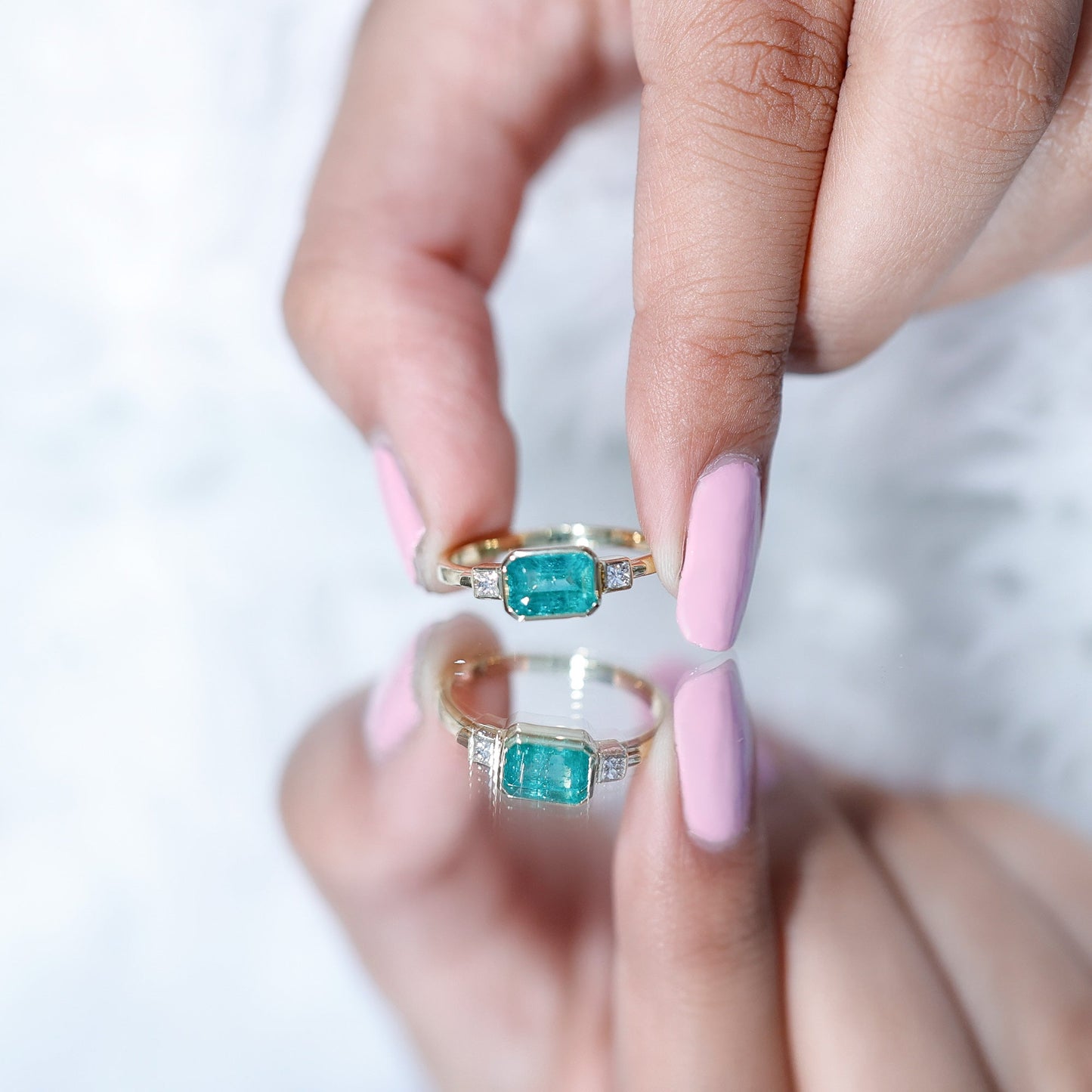 Octagon shape Emerald and Diamond East-West Promise Ring in Bezel Setting