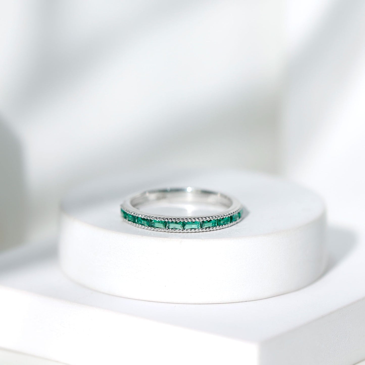 Baguette Cut Lab Grown Emerald Eternity Ring with Beaded Detailing