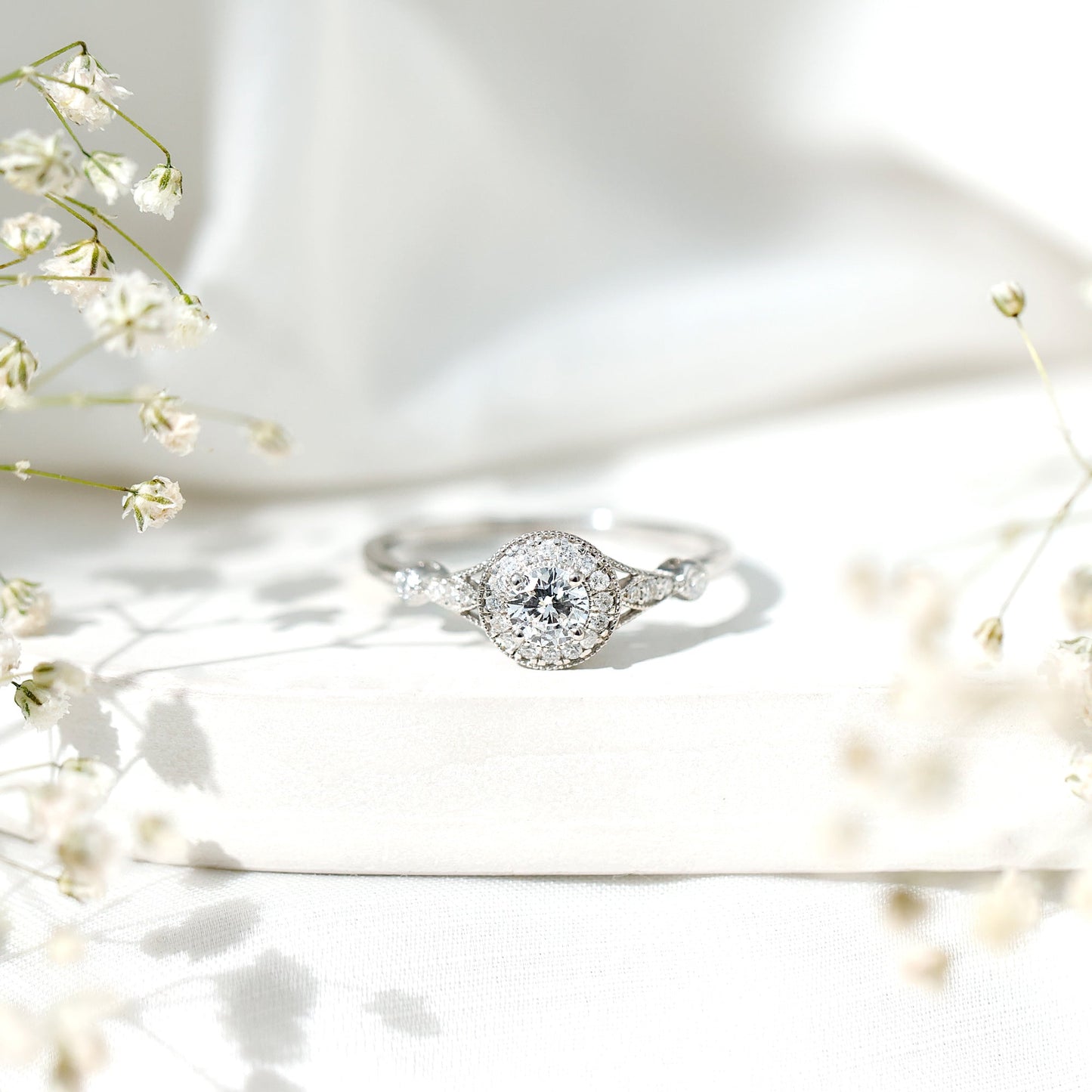 Vintage Looking 0.4 Carat Lab Grown Diamond Halo Engagement Ring With Side Stones