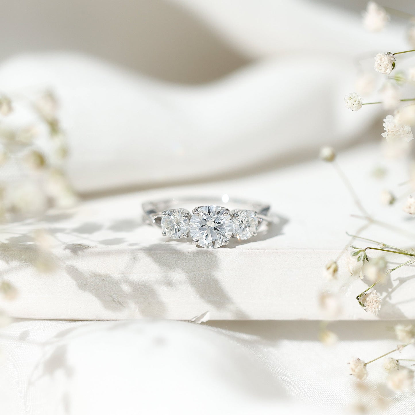 Lab Grown Diamond Three Stone Engagement Ring with Crossover Shank