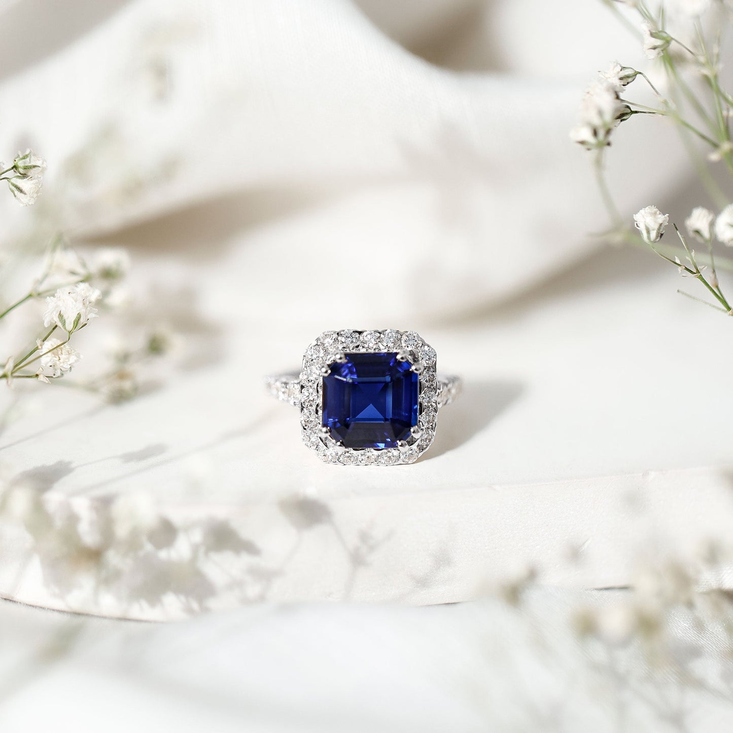 Certified 6.75 Carat Asscher Cut Lab Grown Blue Sapphire Engagement Ring with Diamond Halo