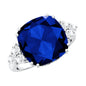 Certified 9 Carat Lab Grown Blue Sapphire Cushion Cut Engagement Ring with Diamond Trio