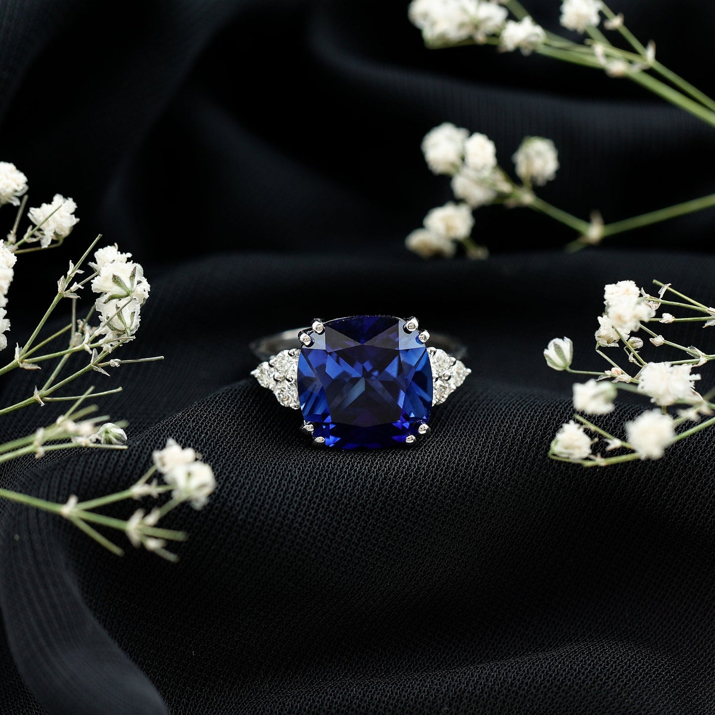 Certified 9 Carat Lab Grown Blue Sapphire Cushion Cut Engagement Ring with Diamond Trio