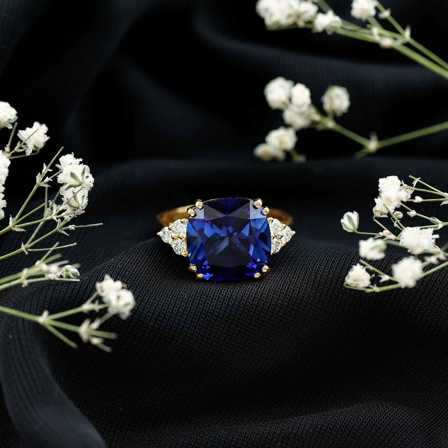 Certified 9 Carat Lab Grown Blue Sapphire Cushion Cut Engagement Ring with Diamond Trio