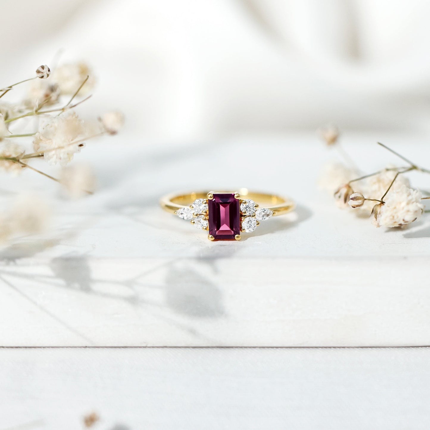 Certified Rhodolite Emerald Cut Engagement Ring with Diamond Trio