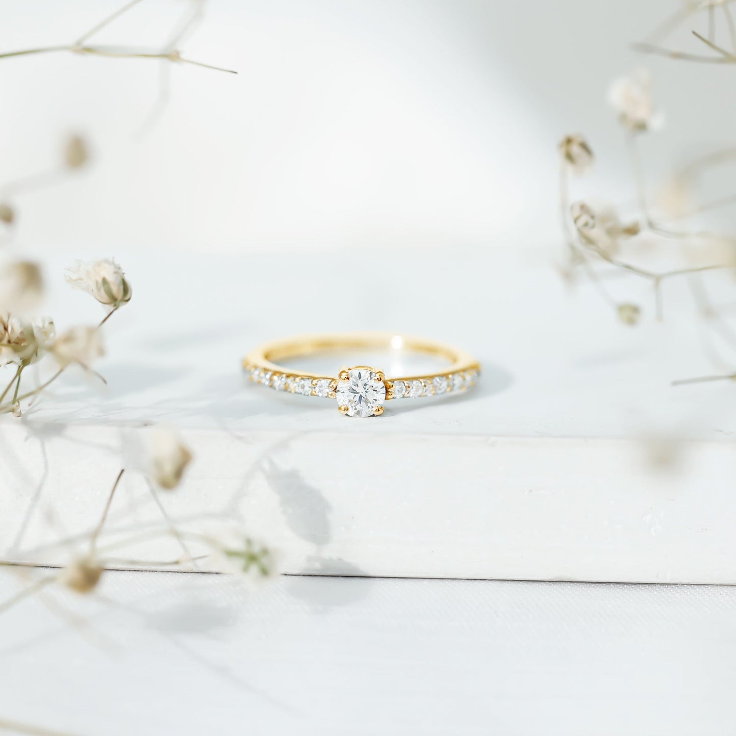 Round Diamond Solitaire Ring with Side Stones