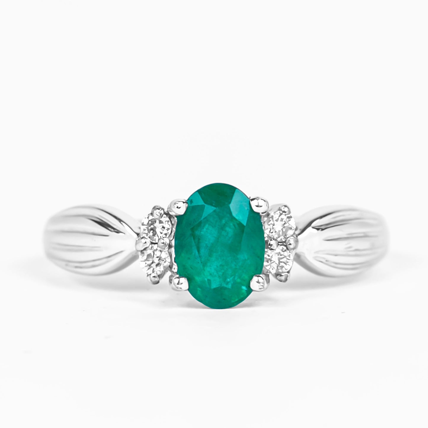 Natural 0.7 Carat Emerald Oval Engagement Ring with Diamond