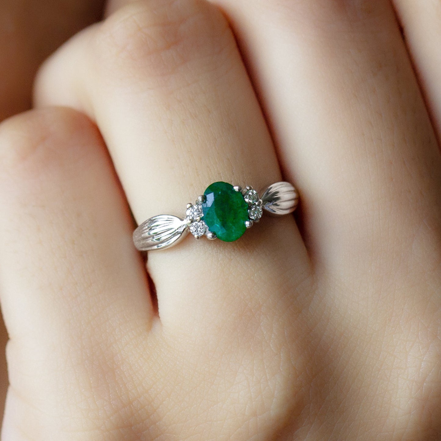 Natural 0.7 Carat Emerald Oval Engagement Ring with Diamond
