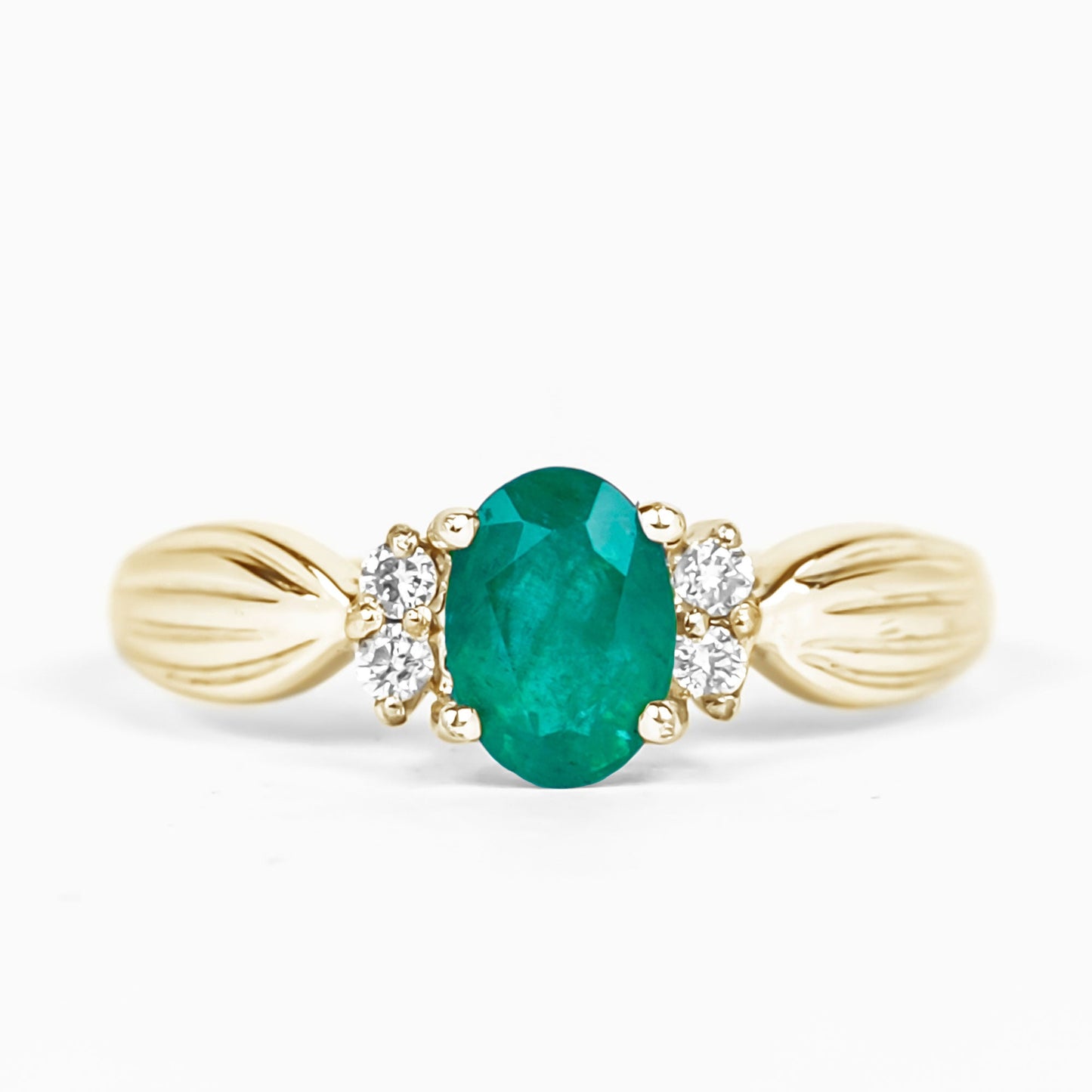 Natural 0.7 Carat Emerald Oval Engagement Ring with Diamond