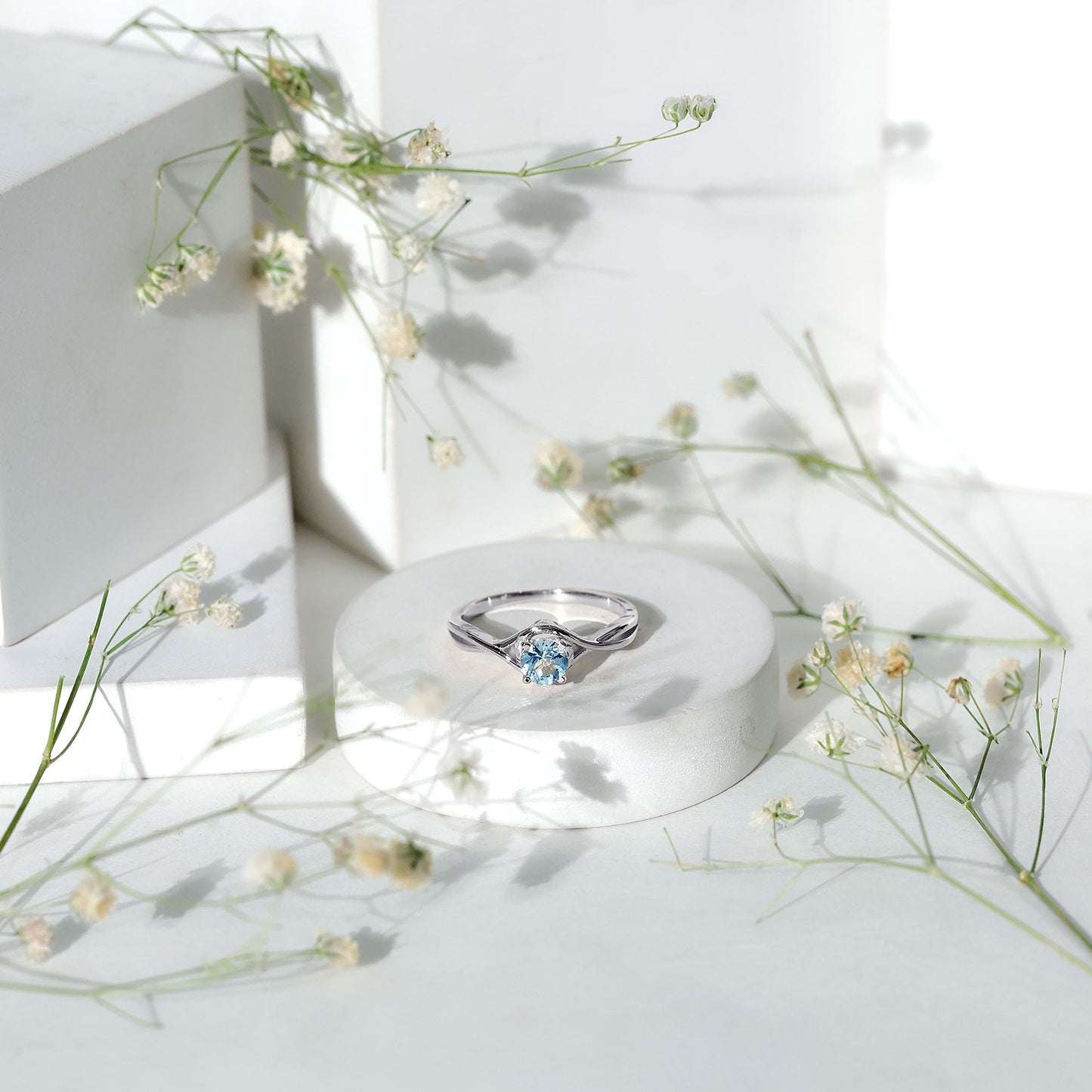 Solitaire Aquamarine Birthstone Ring with Crossover Shank