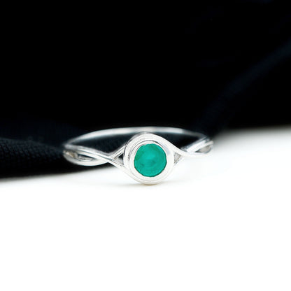 Round Cut Emerald Solitaire Ring with Crossover Band
