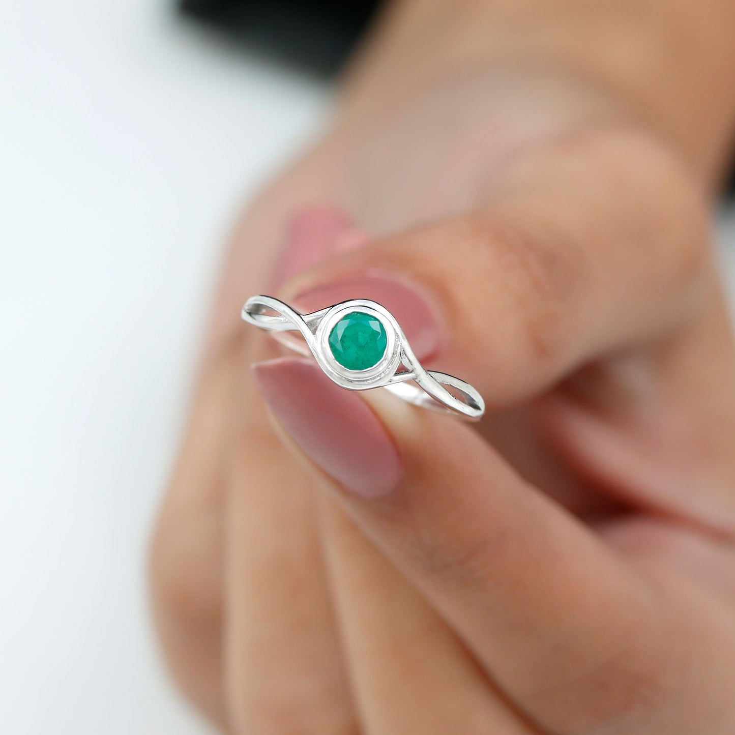 Round Cut Emerald Solitaire Ring with Crossover Band
