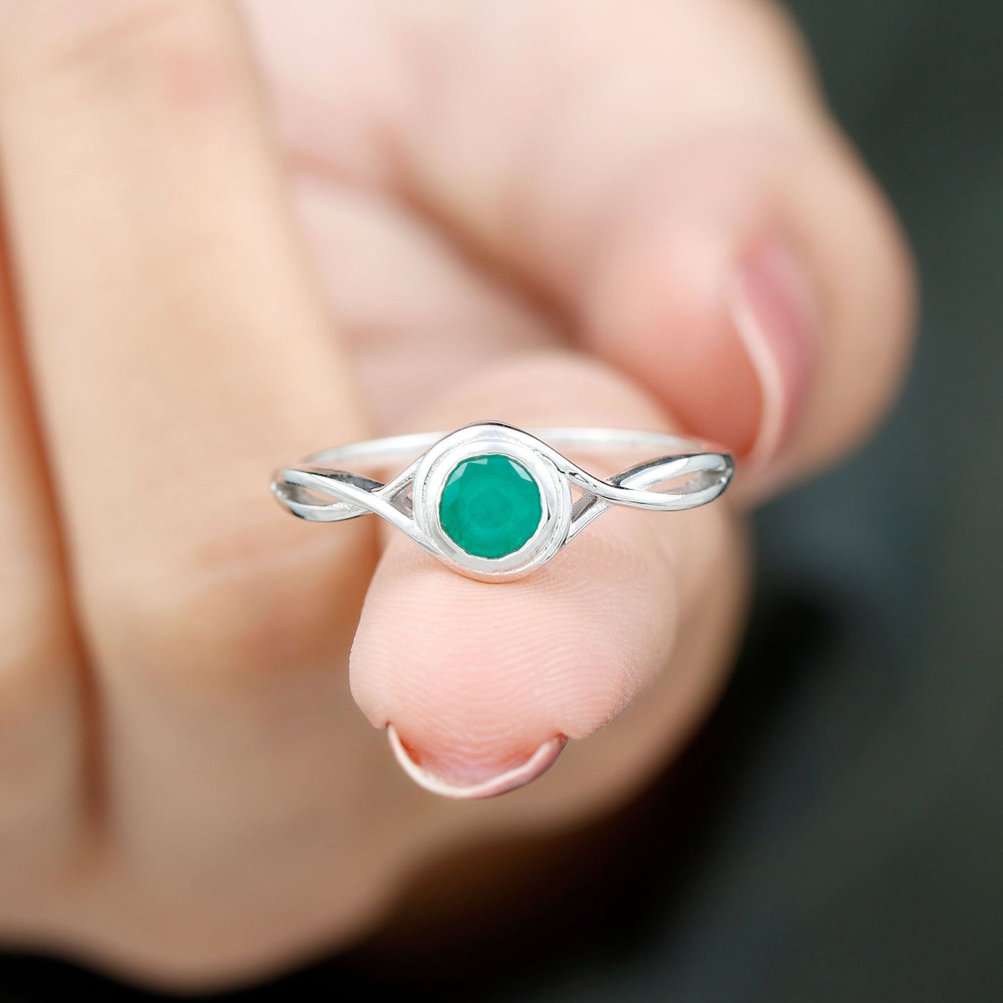 Round Cut Emerald Solitaire Ring with Crossover Band