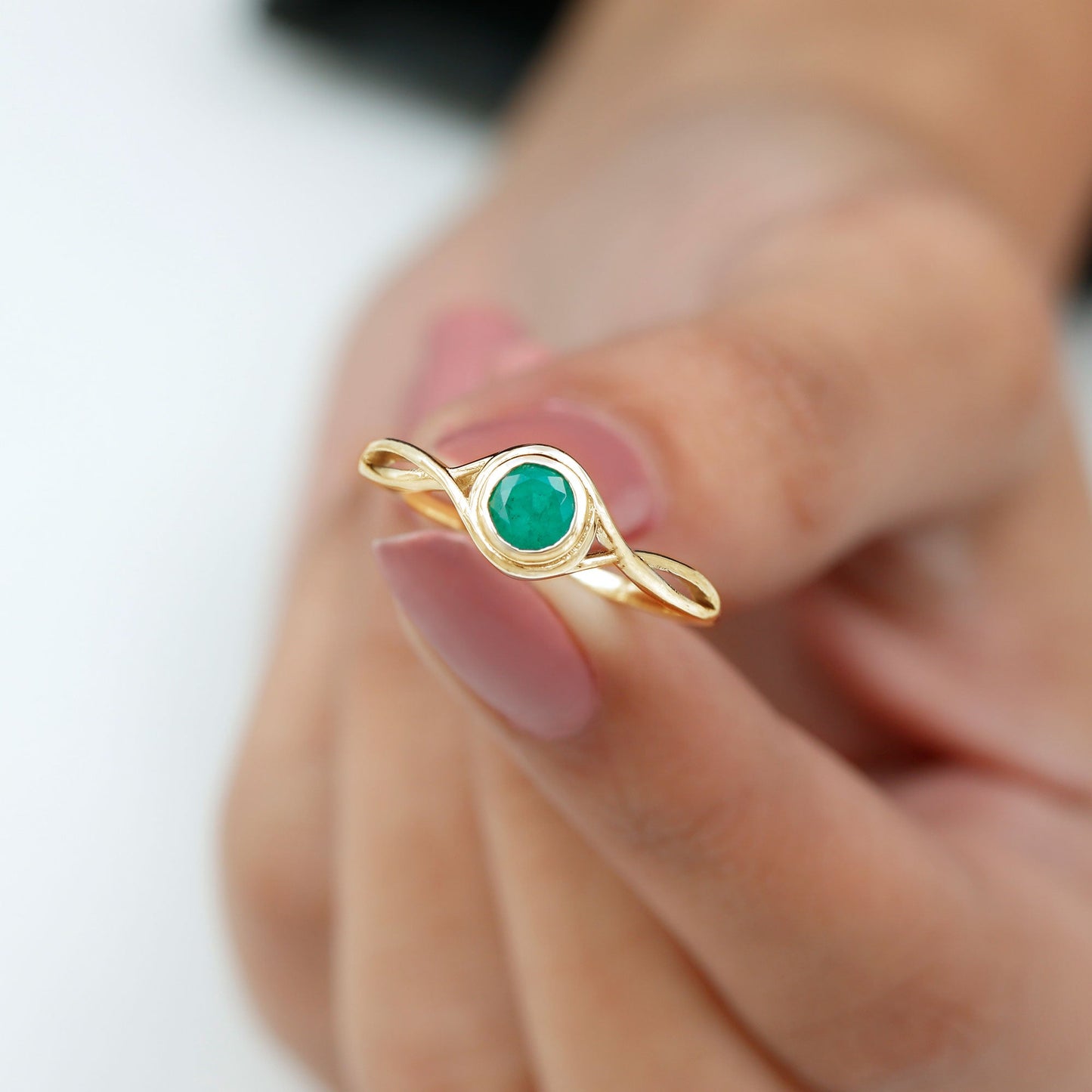 Round Cut Emerald Solitaire Ring with Crossover Band