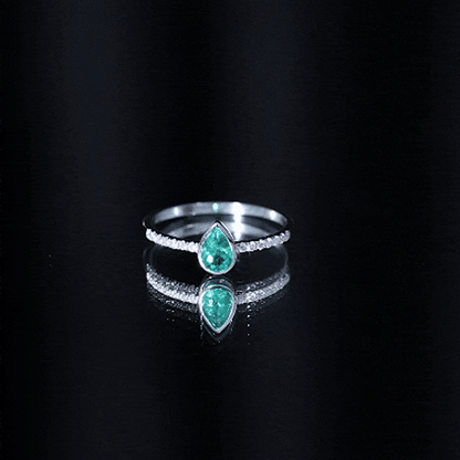 Pear Shaped Emerald Engagement Ring with Diamond Side Stones