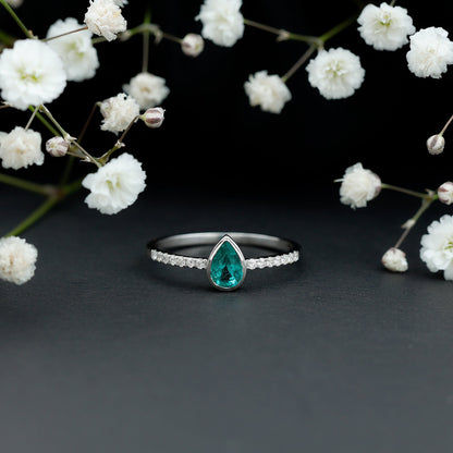 Pear Shaped Emerald Engagement Ring with Diamond Side Stones